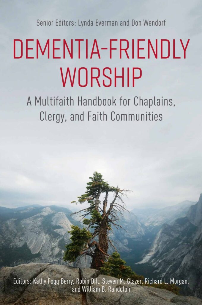 book cover of dementia friendly worship with a photo of a small, withered tree on a rocky summit with mountains in the background